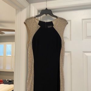 Black and mesh silver beaded (on sides) gown.  Worn once - Excellent condition.
